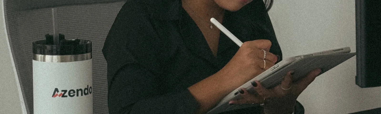 An Azendo product designer sketching interface ideas