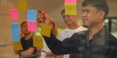 Workshop sticky notes from a retail engagement